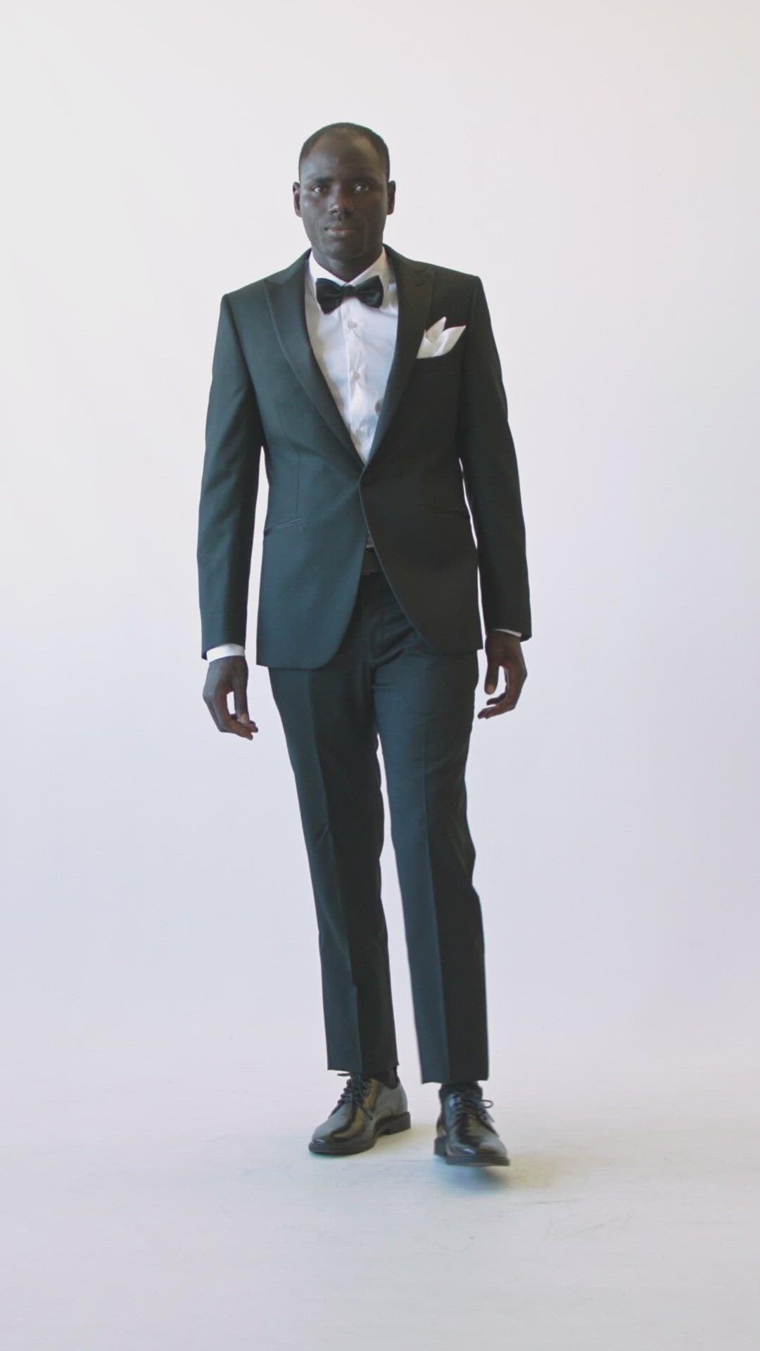 Black Tuxedo With Peak Lapels Made in Wool from the Vitale Barberis Canonico Woollen Mill.